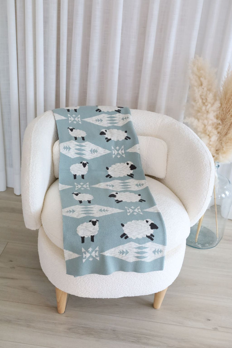 Couverture à motifs - mouton bleu